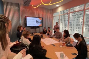 Group of students learning about PR and communications